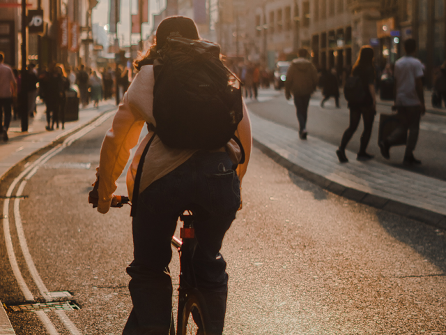 Person cycling in London