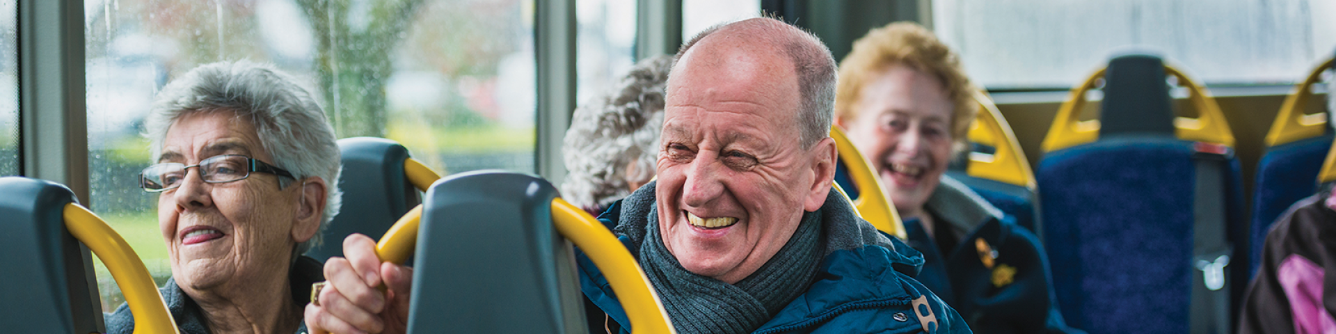 Elderly couple on bus