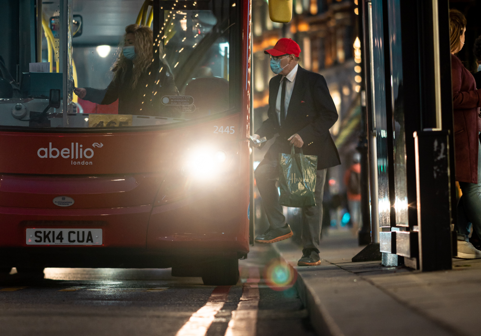 Man boarding a bus