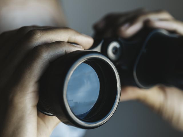 Woman with binoculars