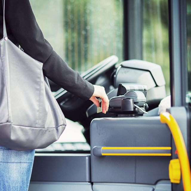 Woman boarding bus