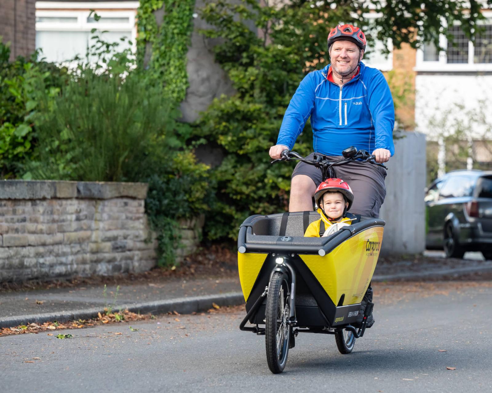 Man and boy on cargo bike