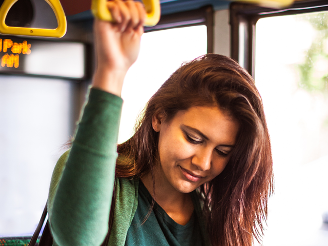 A woman on a bus